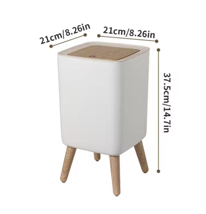 Poubelle salle de bain blanche avec couvercle en bois et pieds en bois.